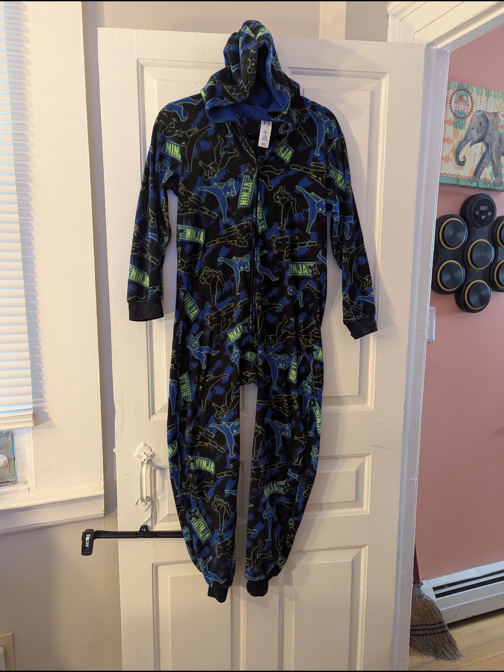 Place Black Hooded Ninja Footed One-Piece with Blue and Green Accents